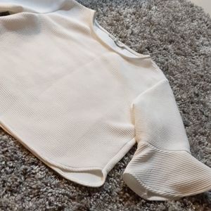 Beautiful top with trumpet sleeves. Made in Italy.